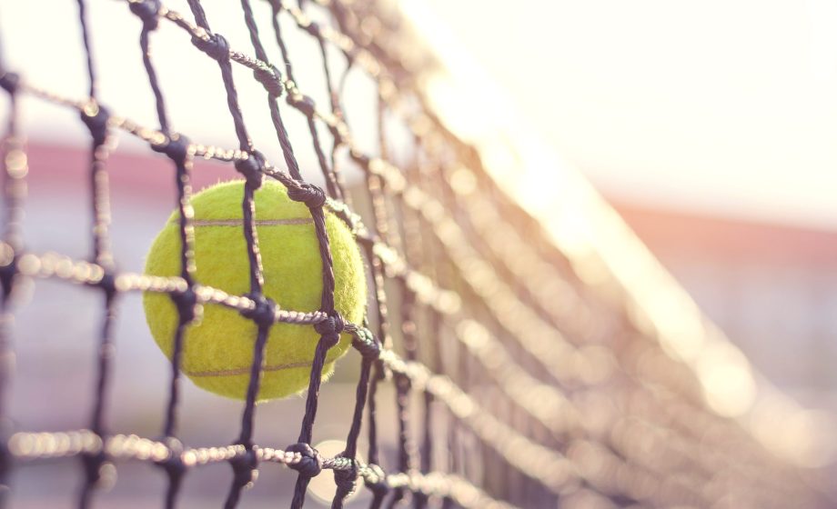 Close,Up,Tennis,Ball,Hitting,To,Net
